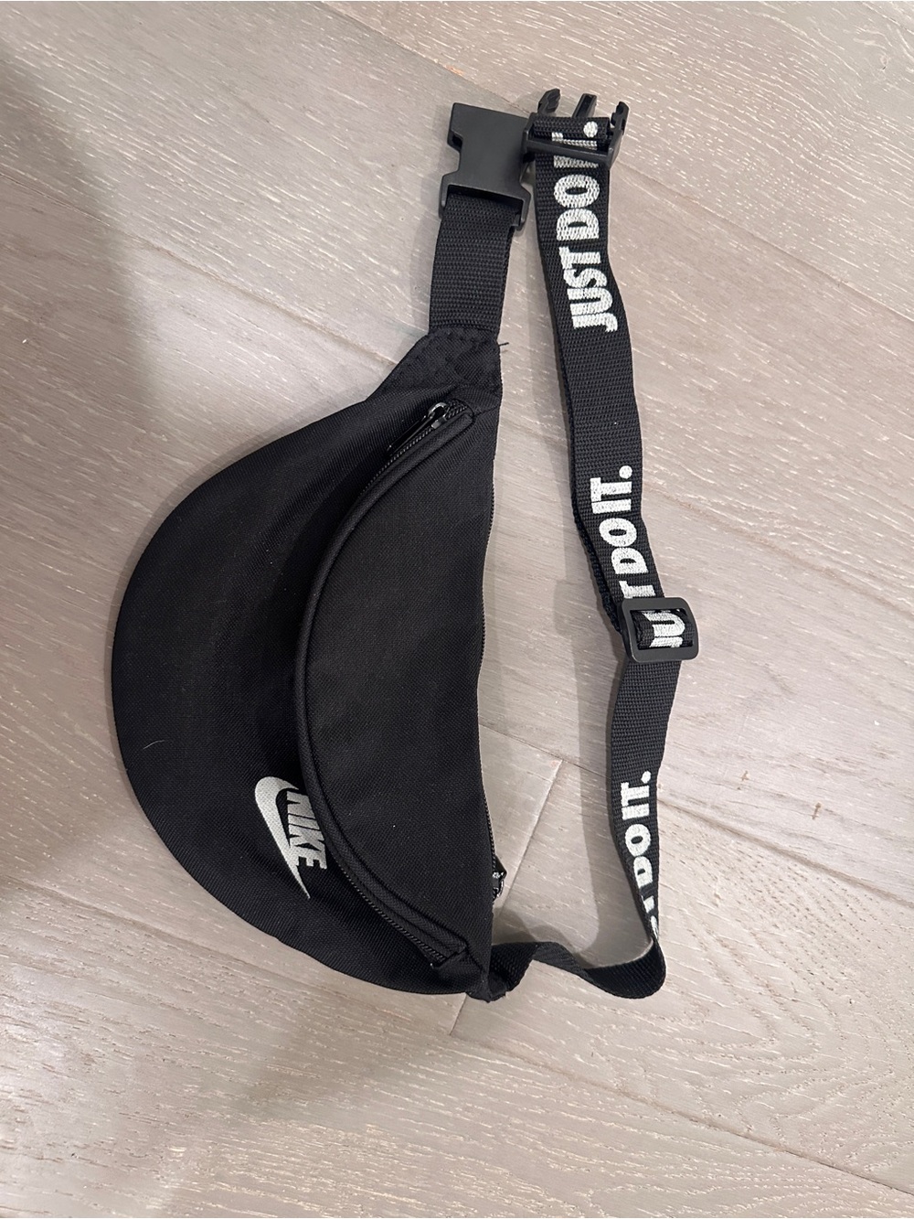 Nike Black Waist Bag with White 'Just Do It.' Strap